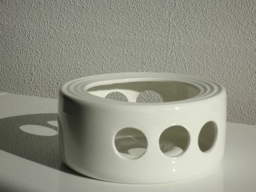 Porseleinen warmhouder
