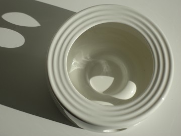 Porseleinen warmhouder